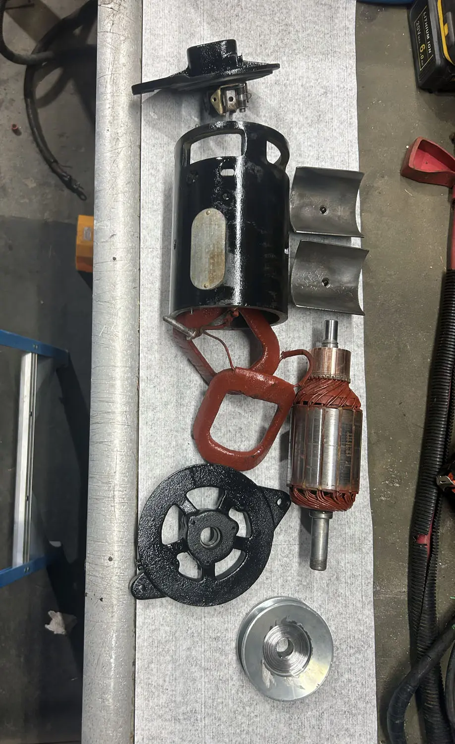 An Automotive Generator taken apart for repairs and rebuilding