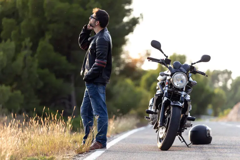 Sturgis-Biker-stuck-on-the-side-of-the-road-in-the-black-hills-calling-for-help
