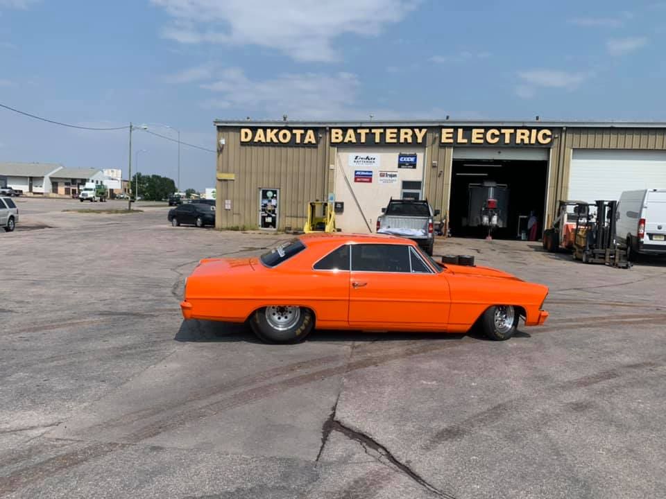 classic car in front of Dakota Battery & electric